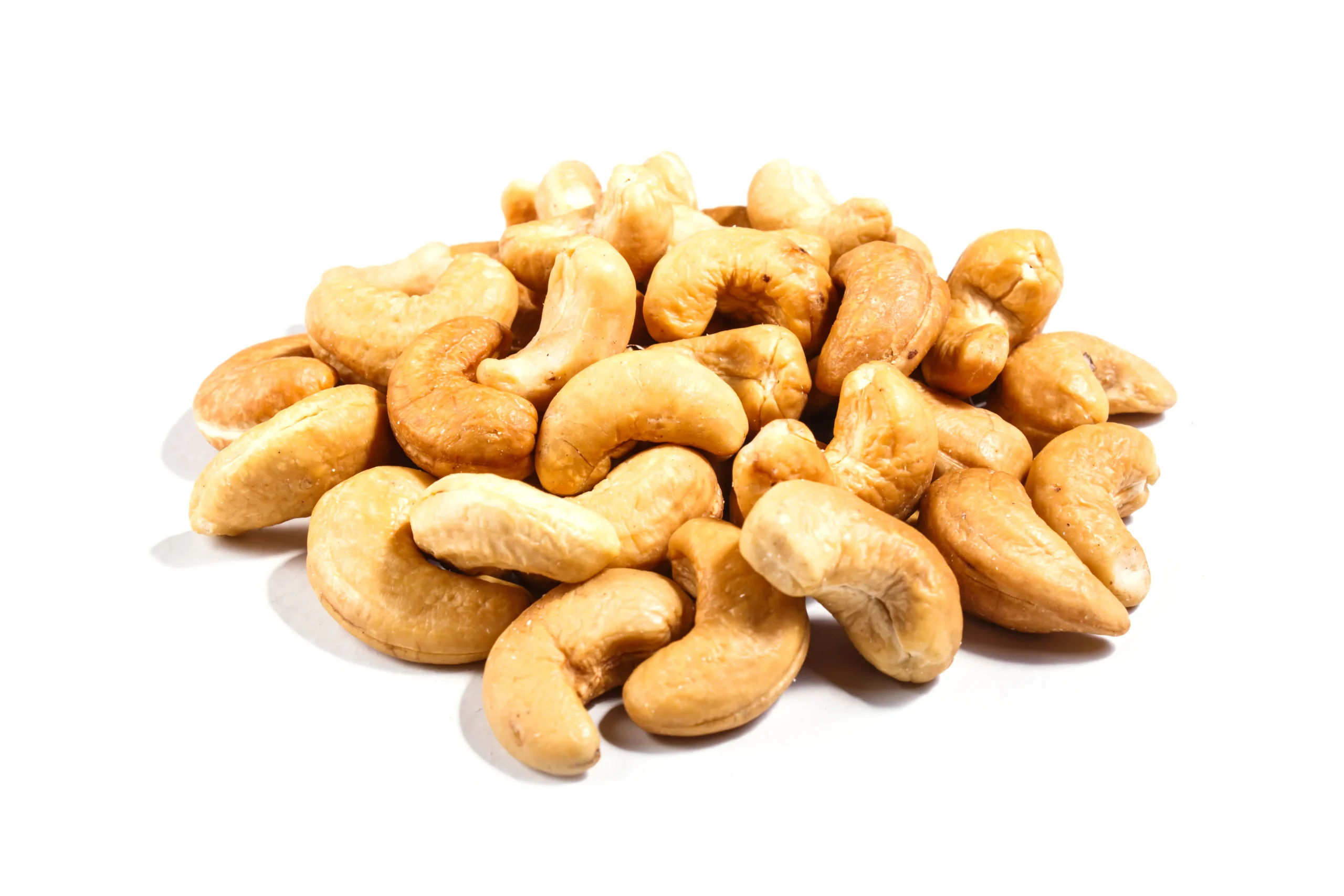 pile-of-cashew-nuts-isolated-on-white-background-2023-11-27-05-14-08-utc